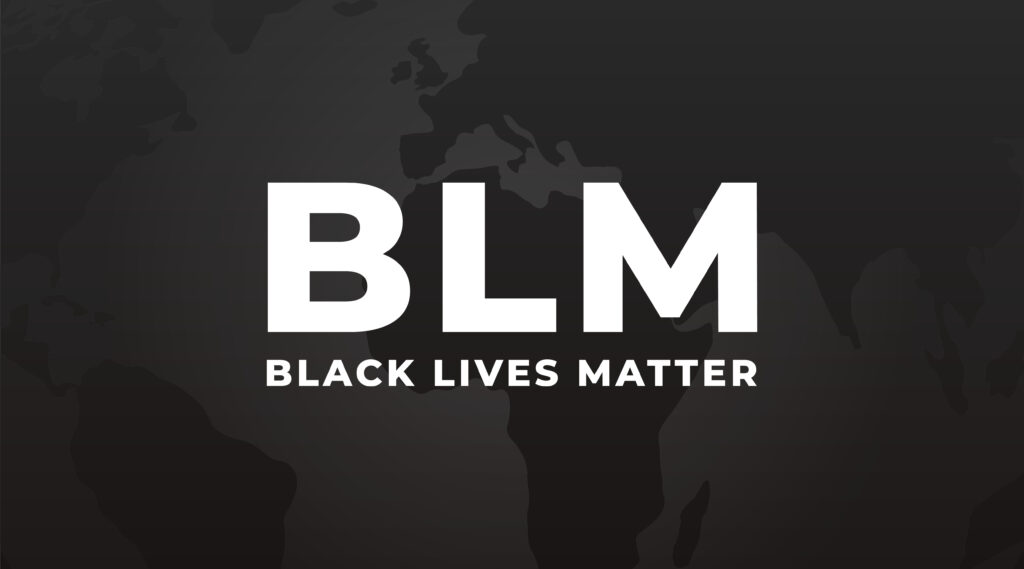 Black Lives Matter (BLM) text over a dark map background — representing the global call for racial justice and equality.