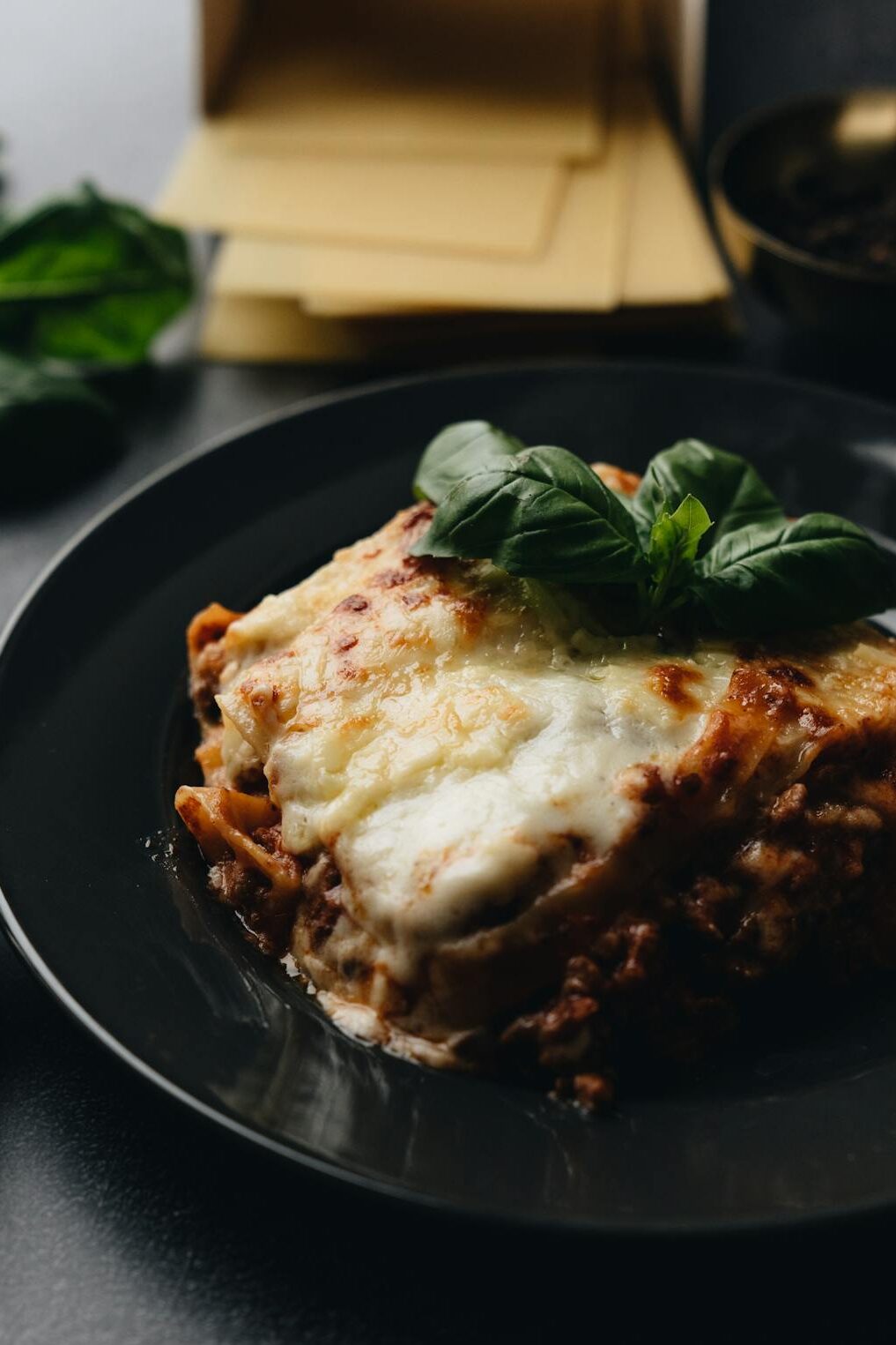 Lasagna alla Bolognese—layered tradition from Bologna, celebrated by Stanley Tucci and steeped in Italian food heritage.