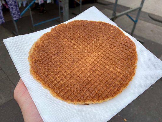 A warm, freshly pressed stroopwafel served at Amsterdam’s Albert Cuyp Market — as featured in Somebody Feed Phil Amsterdam.