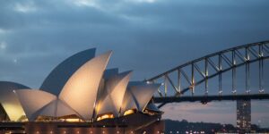 Sydney Opera House and Harbour Bridge at dusk — iconic landmarks featured in Somebody Feed Phil’s Sydney episode, Season 8.