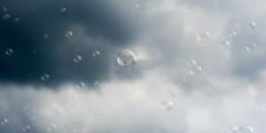 Air bubbles rising against a dramatic cloudy sky, symbolizing the invisible force behind fermentation and bread.
