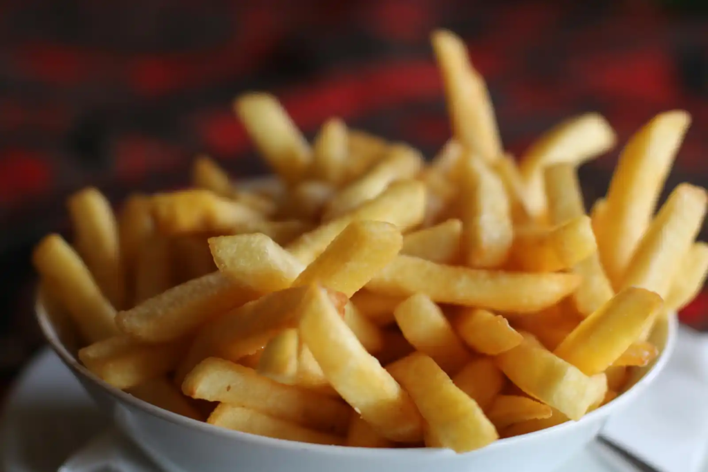 Bowl of classic golden French fries, perfectly crisp and ready to enjoy.