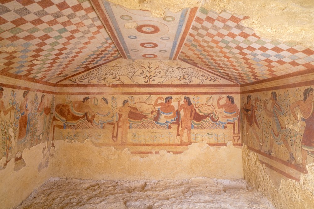 Ancient Etruscan tomb artwork showing early pasta-like dough preparation in 4th century BCE Italy-Origin of Pasta Part 1