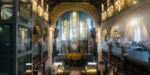 Interior of Mercato Mayfair, an Italian food hall inside a converted church in London, featured in Stanley Tucci Searching for Italy Season 2 Episode 4.