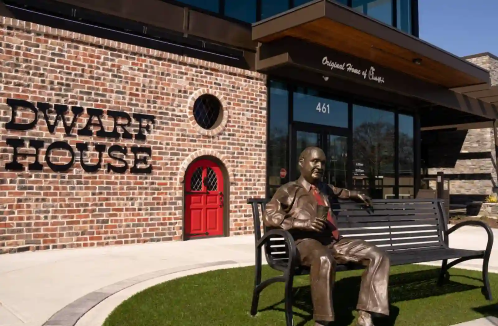 The Dwarf House in Hapeville, GA—original home of Chick-fil-A—with brick facade and founder statue.