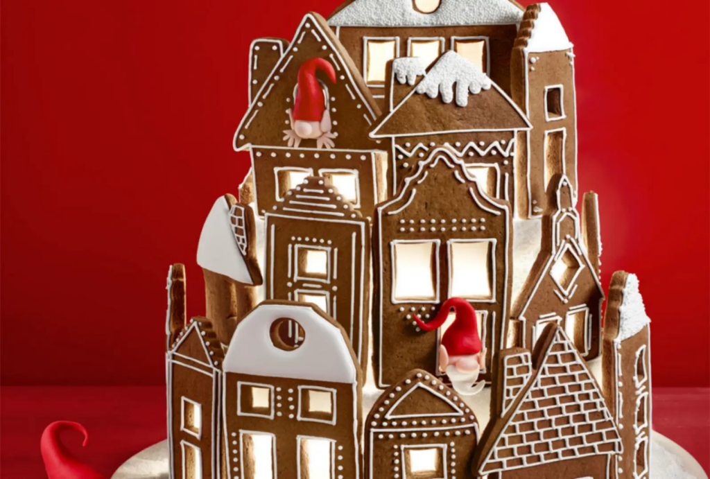 British Baking Show Biscuit Week gingerbread time-capsule box styled as a cookie house with royal-icing details.